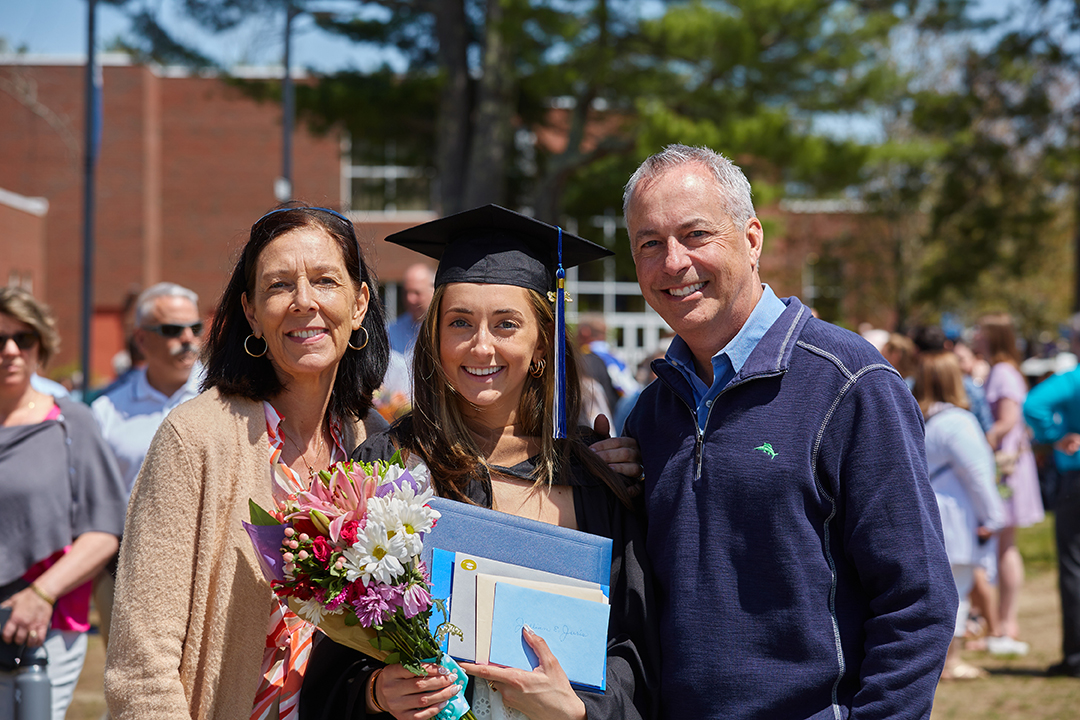 A female graduate and her family after the ceremony.