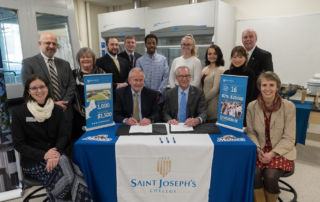 Saint Joseph's College and UNE personnel gather at signing of Pre-Pharmacy Agreement