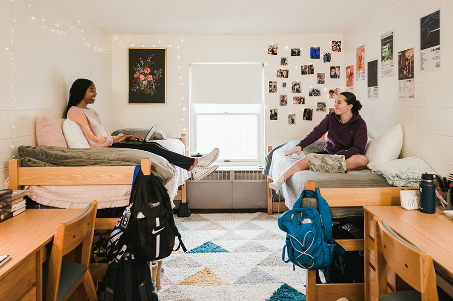 Male student in dorm room at Saint Joseph's College of Maine