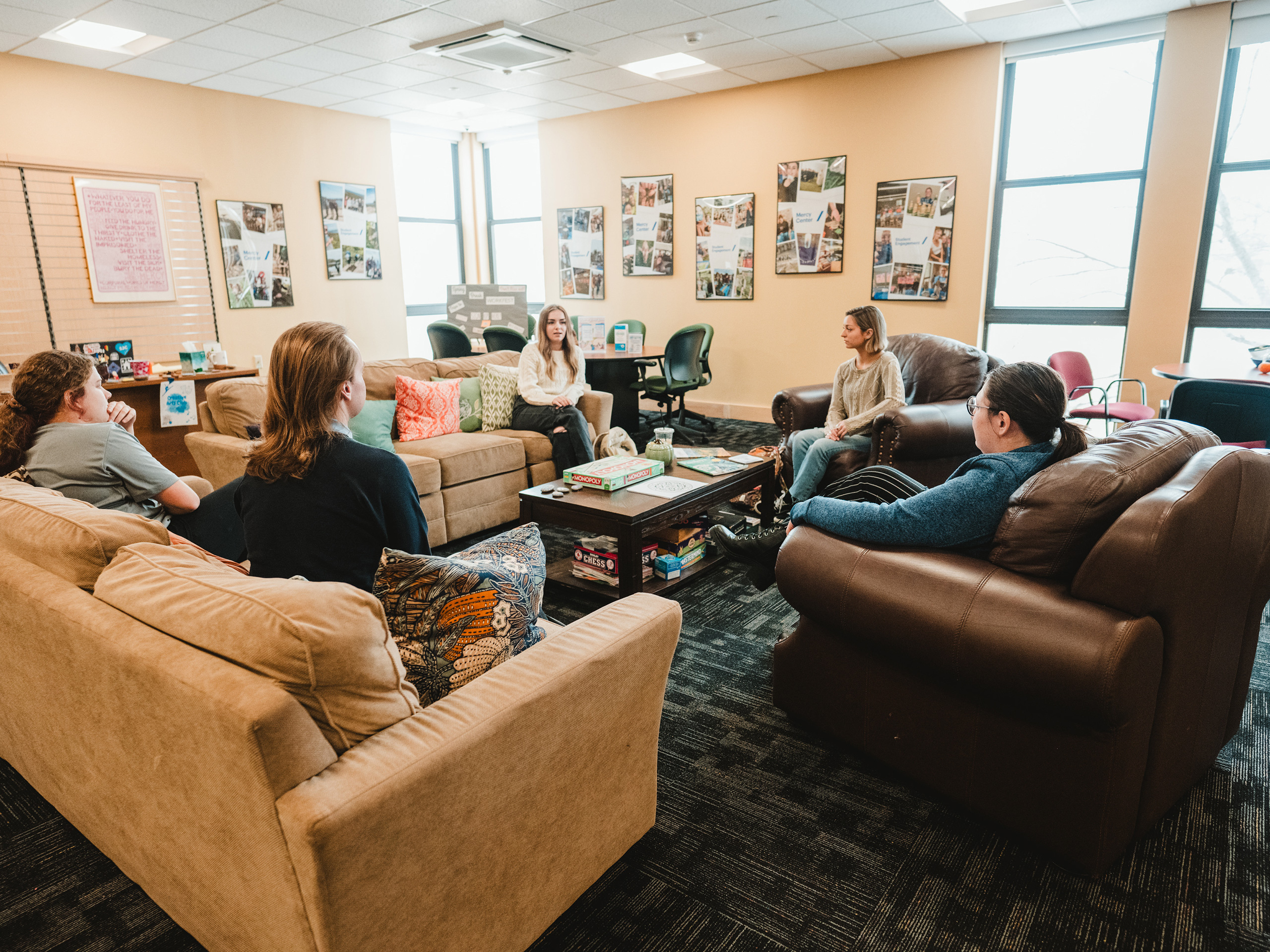Students hang out in the Mercy Center