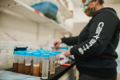 A student analyzes water samples for the Little Sebago Lake Association lake health