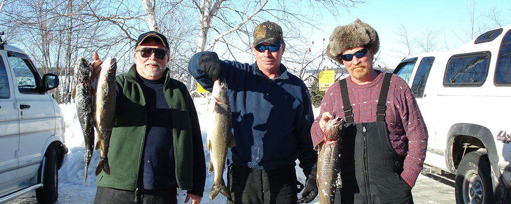 3 male ice fishermen