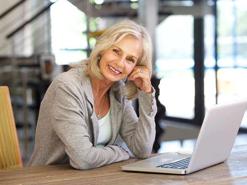 older women by laptop- power series promotion