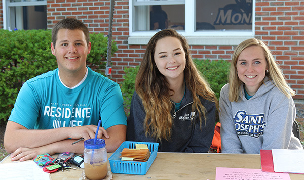 Members of the Res Life team welcome students during move in weekend